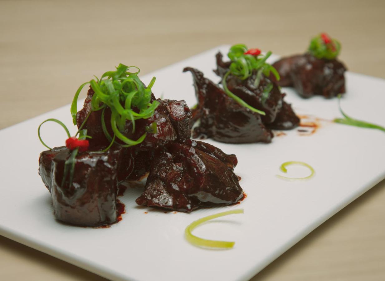 Best Western Premier Batumi Exterior foto A dish of dried abalone